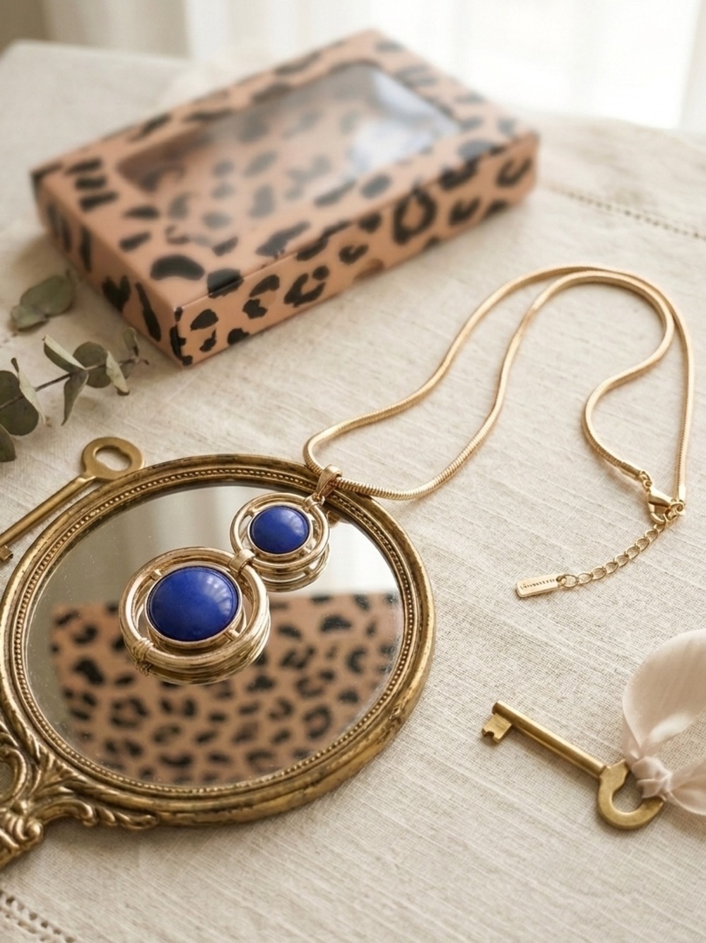 Gold Pendant Necklace with Lapis-Blue Cabochons
